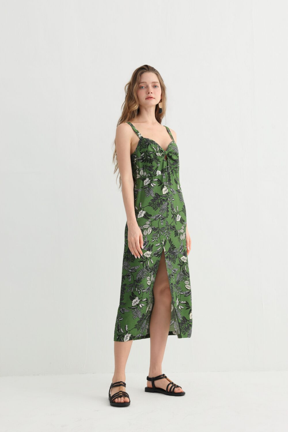Green leaf print spaghetti strap dress side view