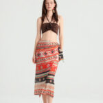 Geometric wrap midi skirt with red-orange striped print